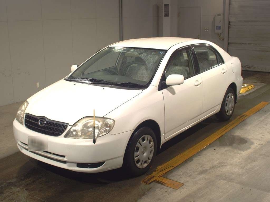 Corolla nze 121. Toyota Corolla nze121 2001. Toyota Corolla 2004 кузов nze121. Corolla с аукционов Японии. Тойота 2001 года модели.