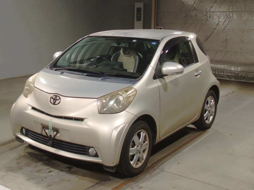 TOYOTA IQ модель кузова: KGJ10, коробка: FAT, год выпуска: 2008 пробег:  101000км, аукционная оценка: 3.5, объем двигателя: 1000куб. см., цвет:  Золотой, аукцион: TAA Kinki, номер лота: №7105, Купить авто с аукциона  Японии